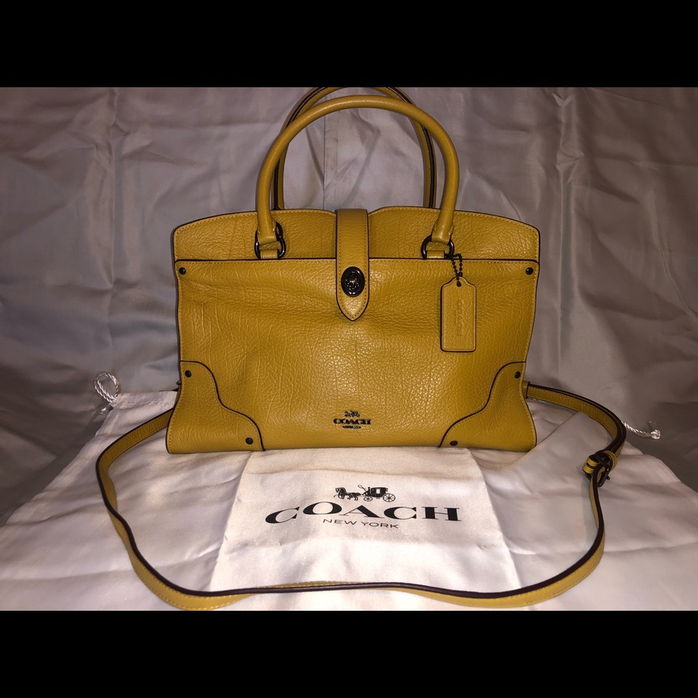 Burnt yellow Coach purse